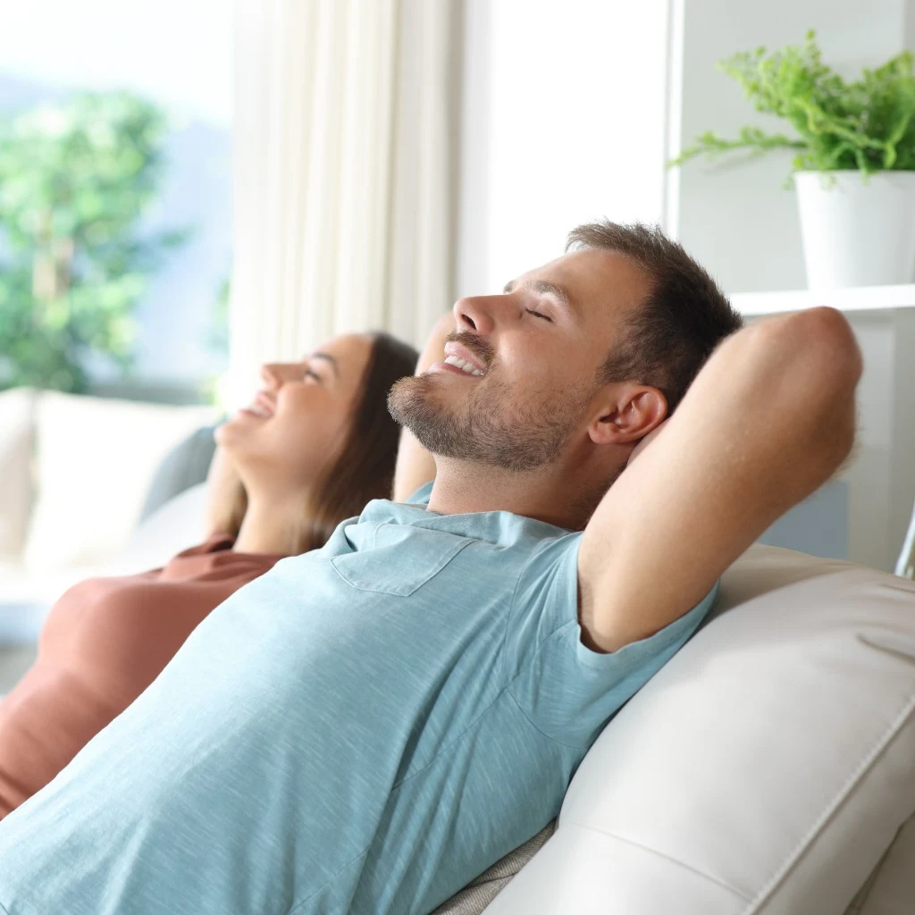 A couple relaxing in a comfortable Toronto-area home